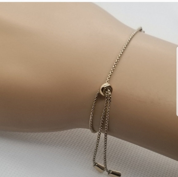 AVON VINTAGE GOLDTONED LIMITED EDITION ADJUSTABLE CHARM BRACELET - Picture 4 of 4